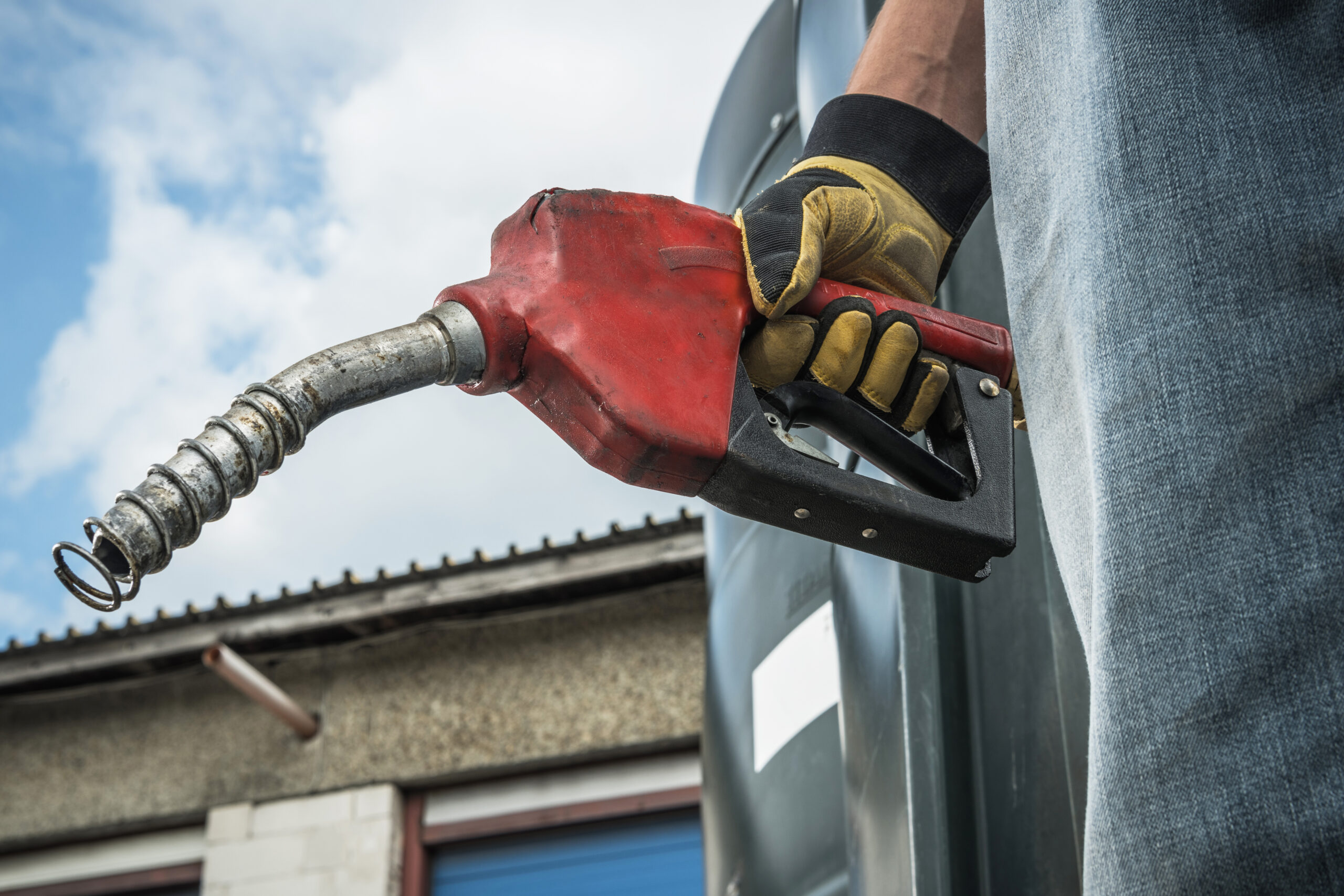 men hold diesel pump nozzle in his hand 2025 03 13 04 05 29 utc scaled