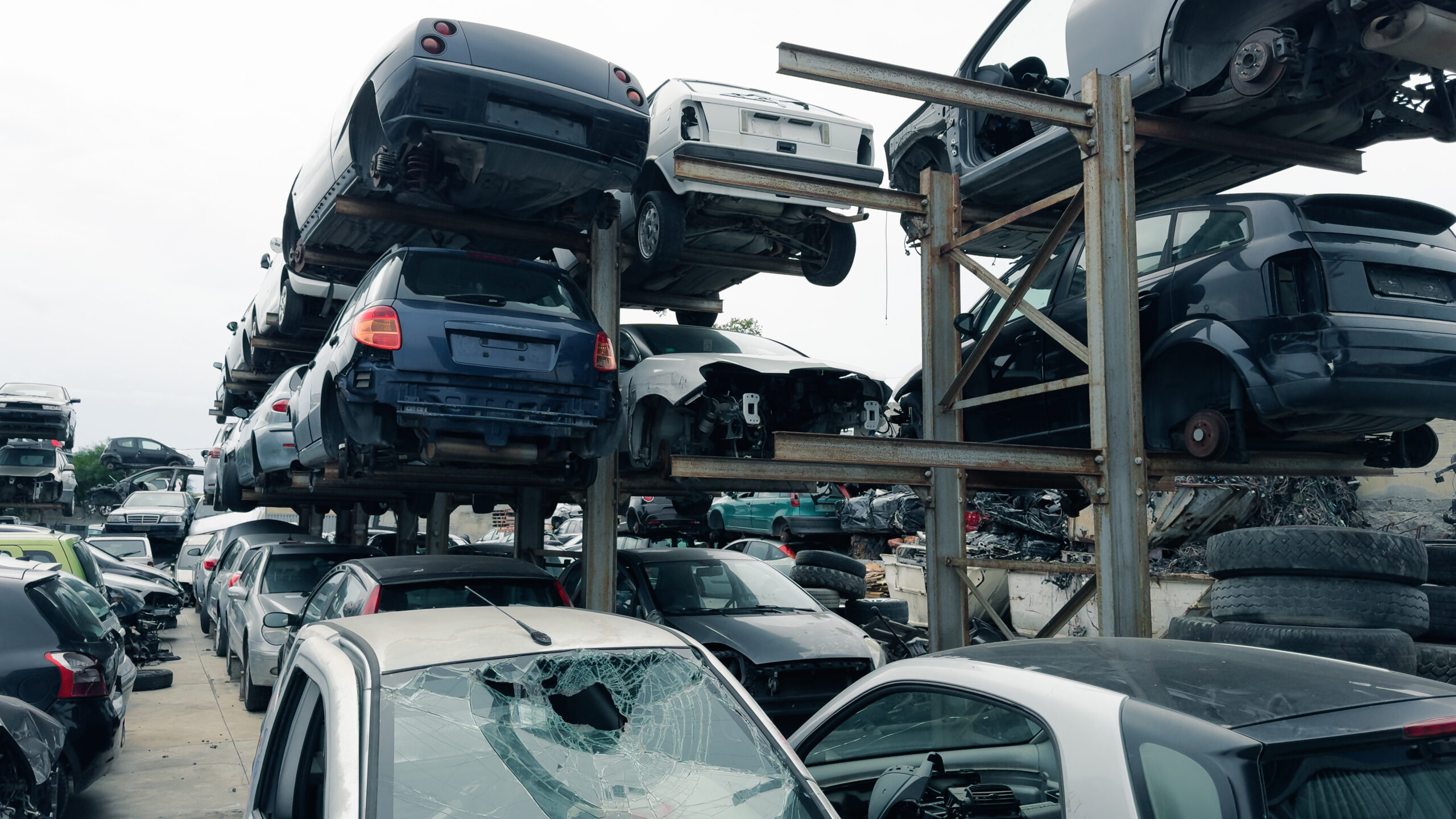 stacked scrap cars recovery of car components 2025 01 29 03 11 32 utc scaled